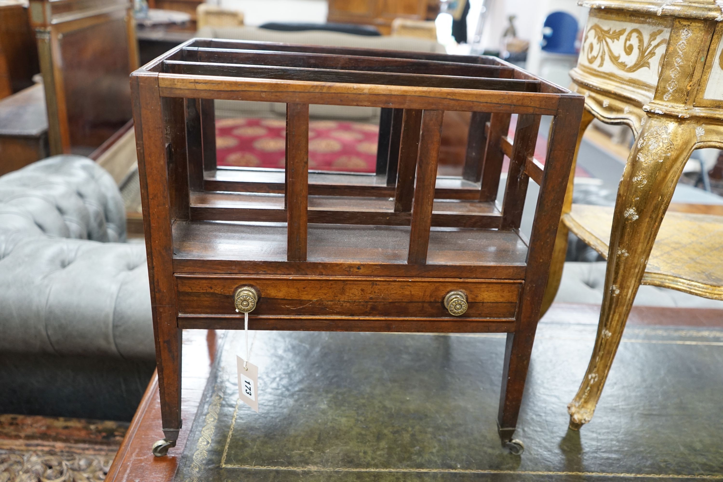 A Regency provincial rosewood three division Canterbury, width 45cm, depth 32cm, height 48cm